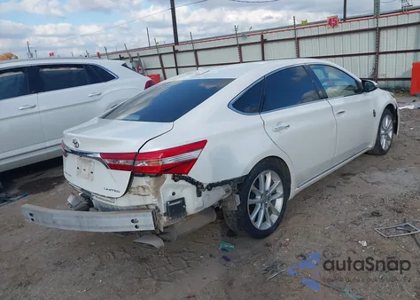 2014 Toyota Avalon Limited z USA, uszkodzony, nr VIN 4T1BK1EB9EU127702